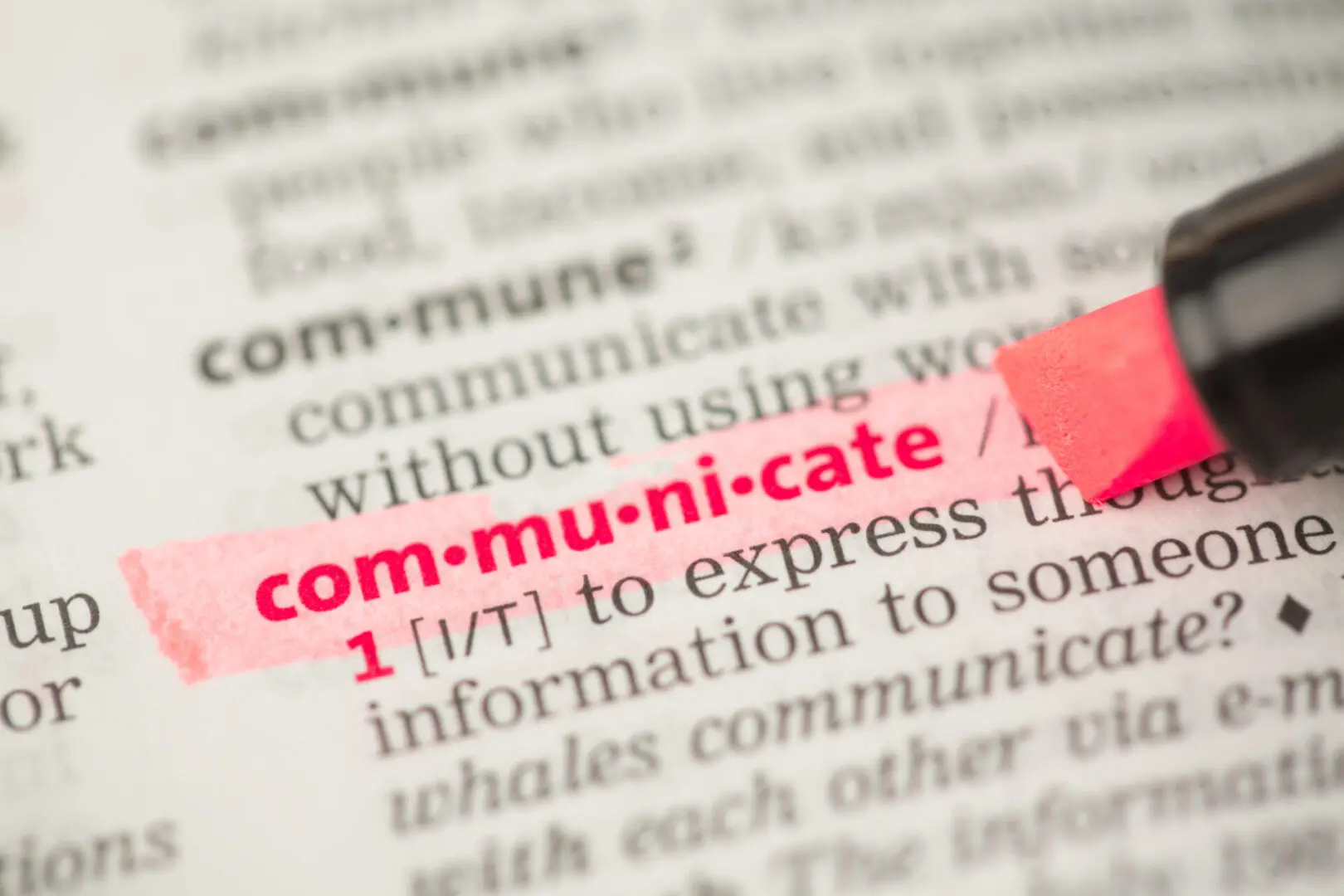 Communicate definition highlighted in red in the dictionary