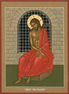 Jesus Christ imprisoned in a cell.